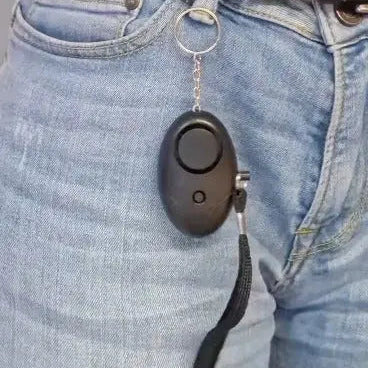 Alarme personnelle noir porté pantalon