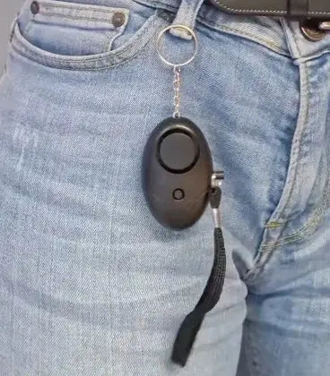 Alarme personnelle noir porté pantalon